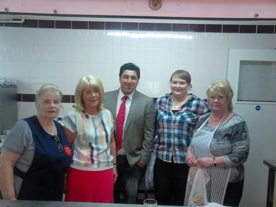 With volunteers at a local church soup kitchen